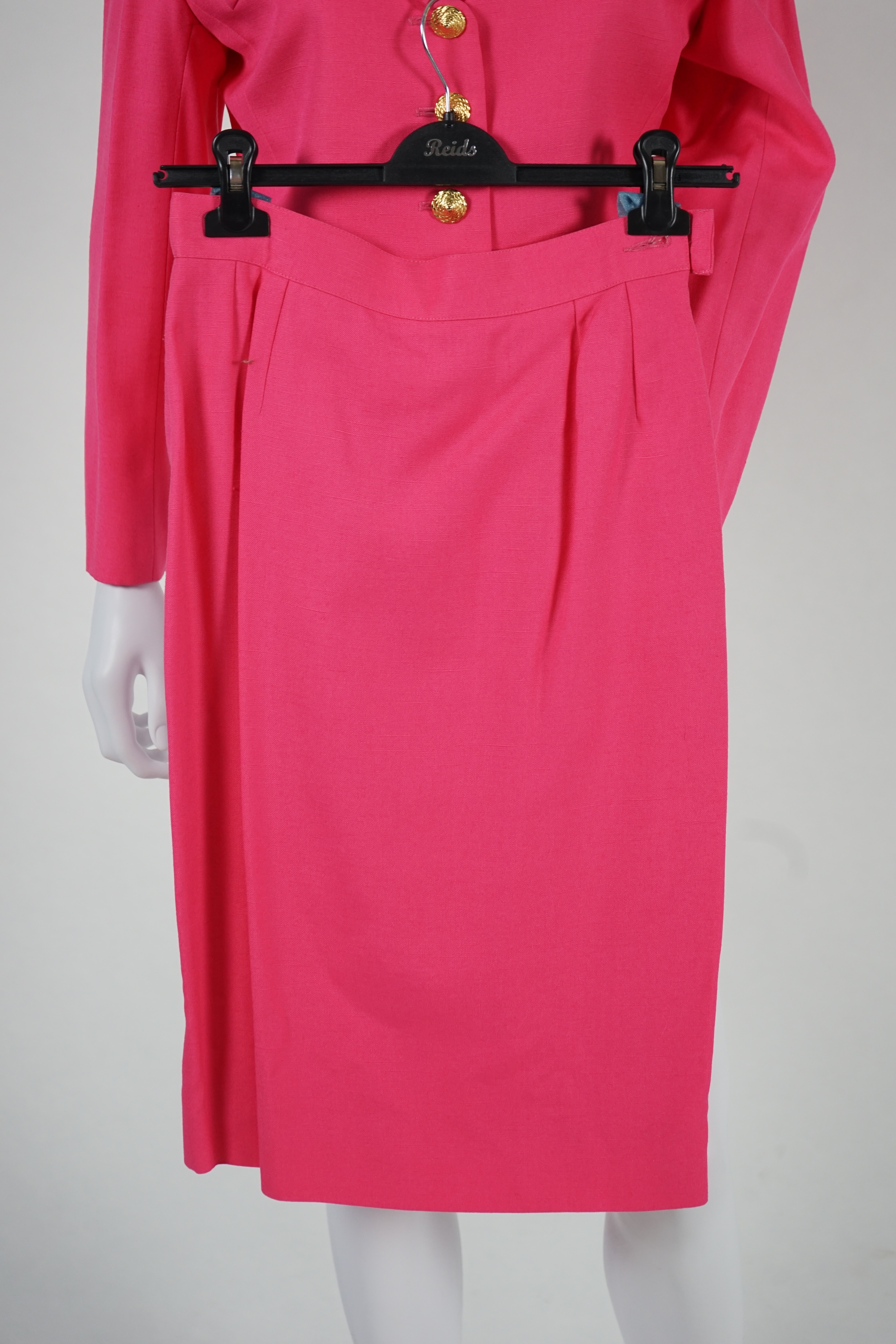 Three vintage Yves Saint Laurent variation lady's skirt suits, F 38 (UK 10). Please note alterations to make the waist smaller may have been carried out on some of the skirts. Proceeds to Happy Paws Puppy Rescue.